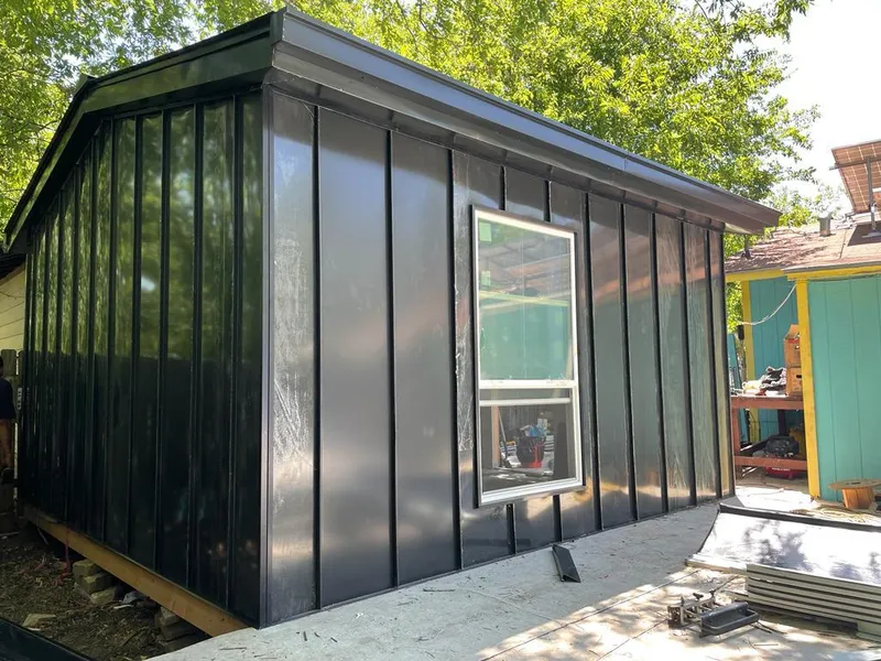 Black standing seam metal wall panels for Metal Roof Installation in Barrington